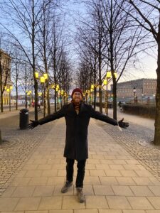 Young man with a gryffindor scarf in stockholm
